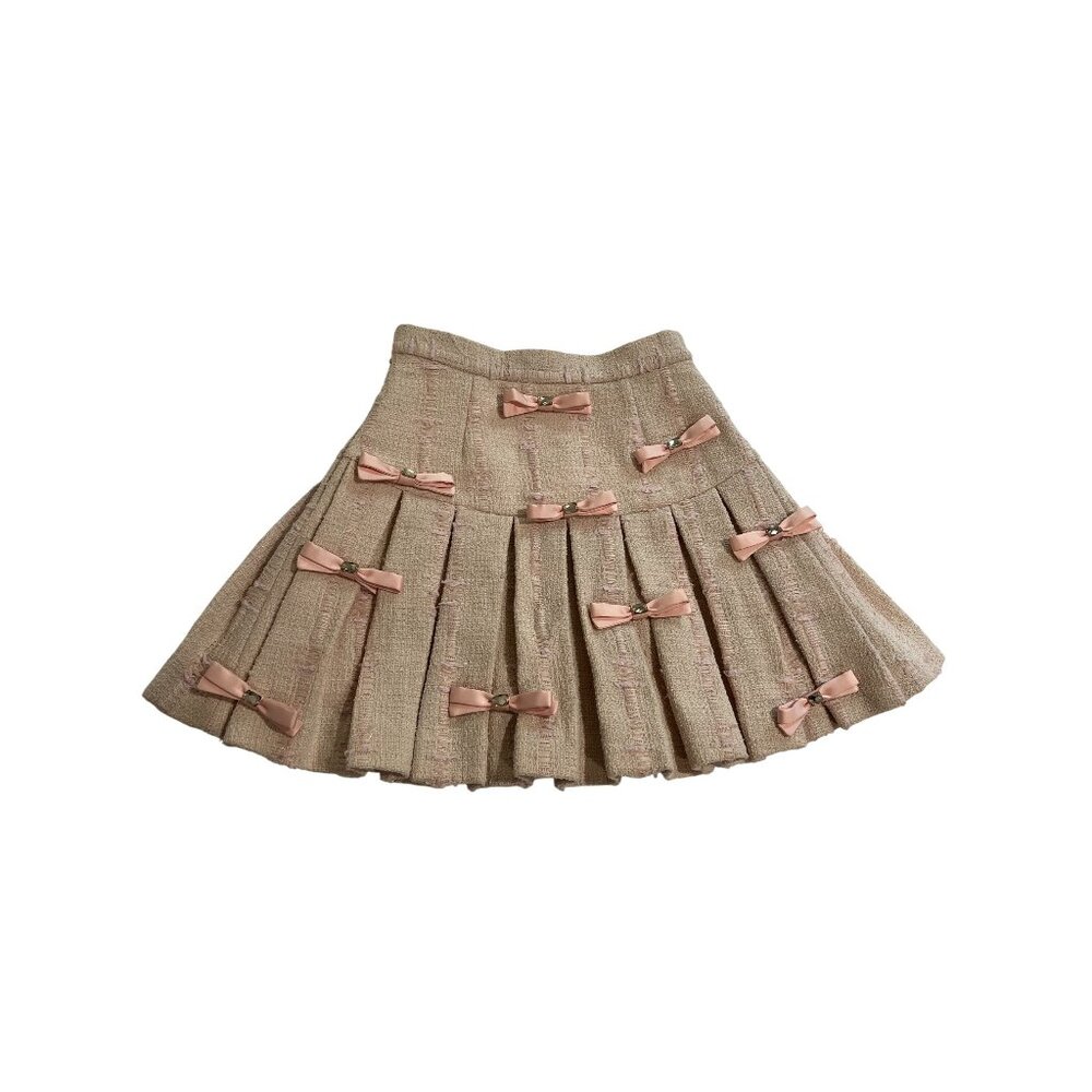 OZLANA Beige Pleated Skirt With Pink Bows